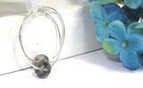 Gray And Silver Hoop Earrings--if you're searching for a classy, dressy pair of hoop earrings, these gray hoops are beautiful and simple in design! See them up close here https://wrist-flair.myshopify.com/collections/beaded-earrings/products/gray-beaded-silver-hoop-earrings