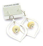off white beaded silver teardrop earrings--modern glass beaded jewelry for her. This is a great staple pair of earrings to add to your wardrobe! Simple, elegant yet noticeable. See this pair up close by clicking here https://wrist-flair.myshopify.com/collections/beaded-earrings/products/beige-beaded-silver-teardrop-earrings