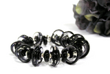 Black and Silver Toggle Bracelet--do you love finding neutral colored jewelry that works for your wardrobe all year long? I do too! You cannot go wrong choosing this stunning black glass beaded bracelet. Perfect for your next business meeting or night out on the town! See it up close by clicking here https://wrist-flair.myshopify.com/collections/statement-bracelets/products/black-glass-beaded-bracelet