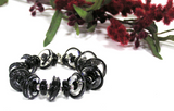 Black Beaded Toggle Bracelet--add some noticeable class and flair to complete your dressy look! This black bracelet features handmade glass beads and a silver toggle. See it up close here https://wrist-flair.myshopify.com/collections/statement-bracelets/products/black-glass-beaded-bracelet