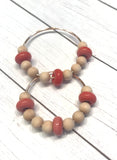 wood and coral beaded hoop earrings
