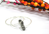 Gray Beaded Hoops--essential jewelry every girl should have in their wardrobe! See them here https://wrist-flair.myshopify.com/collections/beaded-earrings/products/gray-beaded-silver-hoop-earrings