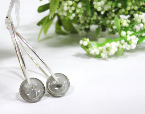 Gray Beaded Hoop Earrings--simple, classy hoop earrings featuring transparent gray glass beads. Beautiful and unique! See this pair up close at https://wrist-flair.myshopify.com/collections/beaded-earrings/products/gray-beaded-silver-hoop-earrings