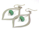 Green Beaded Earrings--glass beaded jewelry that is colorful and gives you a fresh look! See this pair up close at https://wrist-flair.myshopify.com/collections/beaded-earrings/products/green-beaded-silver-teardrop-earrings