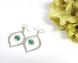 Modern Green Earrings With Silver Teardrop Design--fresh, stylish and modern! See them here https://wrist-flair.myshopify.com/collections/beaded-earrings/products/green-beaded-silver-teardrop-earrings