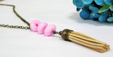 beige tassel necklace with pink beads