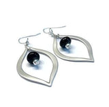 Black beaded silver teardrop earrings--perfect jewelry to go with that little black dress! This gorgeous pair is modern by design and a great pick for staple/essential jewelry to wear often with just about everything in your wardrobe. Great choice for professional attire at a business meeting or a night out on the town! See them up close here: https://wrist-flair.myshopify.com/collections/beaded-earrings/products/black-glass-beaded-silver-teardrop-earrings