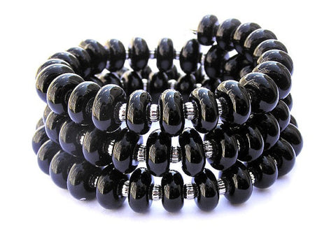 Don't you love finding modern jewelry that is neutral in color that you can rely on all year long? Take your style and look up a notch with this gorgeous black glass beaded wrap bracelet! See it up close here https://wrist-flair.myshopify.com/collections/stretchy-wrap-bracelets/products/black-wrap-bracelet