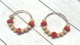 coral and wood beaded hoop earrings