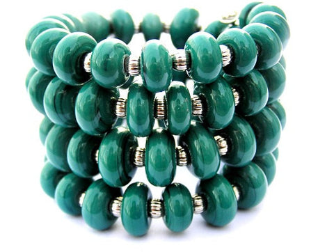 Dark Green Wrap Bracelet--unique in color and modern by design! This gorgeous forest green bracelet features handmade glass beads and comfortably wraps around your wrist three times. See it up close here https://wrist-flair.myshopify.com/collections/stretchy-wrap-bracelets/products/forest-green-wrap-bracelet