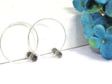 Simple Sterling Silver Hoop Earrings With Smoky Quartz Beads--neutral colored jewelry that matches everything! See this pair up close here https://wrist-flair.myshopify.com/collections/beaded-earrings/products/gray-beaded-silver-hoop-earrings