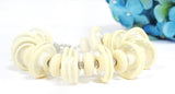 Cream Statement Bracelet--glass beaded handmade jewelry that helps you complete your look! See this bracelet up close by visiting https://wrist-flair.myshopify.com/collections/statement-bracelets/products/off-white-statement-bracelet