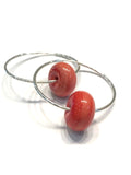 salmon colored hoop earrings